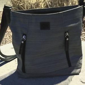 NWOT Roots cross body purse